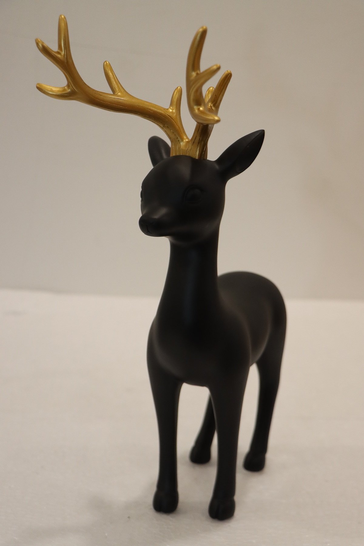 Elegant Gold & White/Black Reindeer Figurines - Image 3