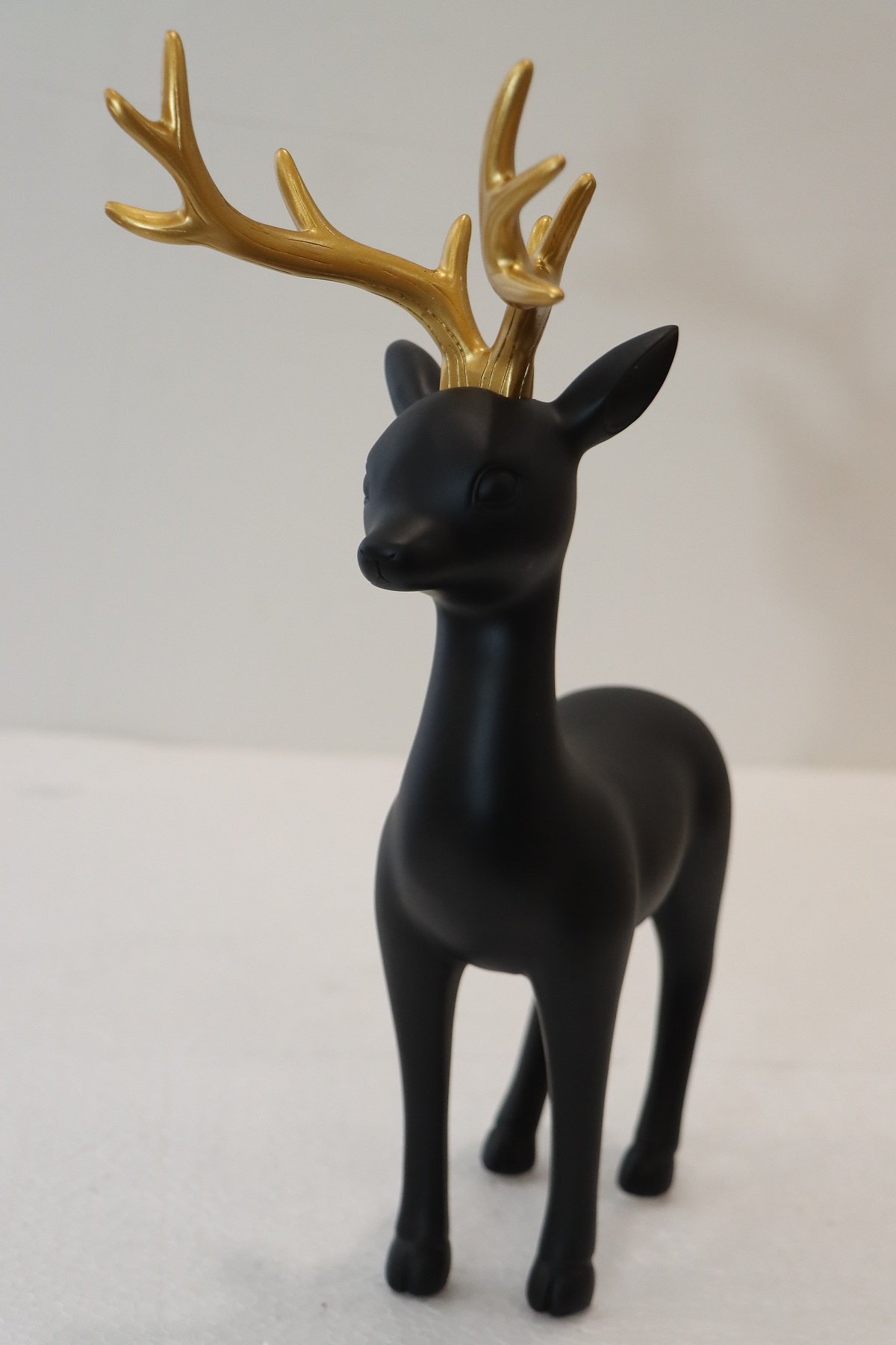 Elegant Gold & White/Black Reindeer Figurines - Image 4