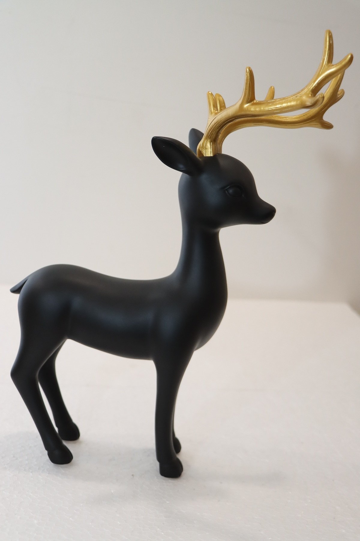 Elegant Gold & White/Black Reindeer Figurines - Image 5