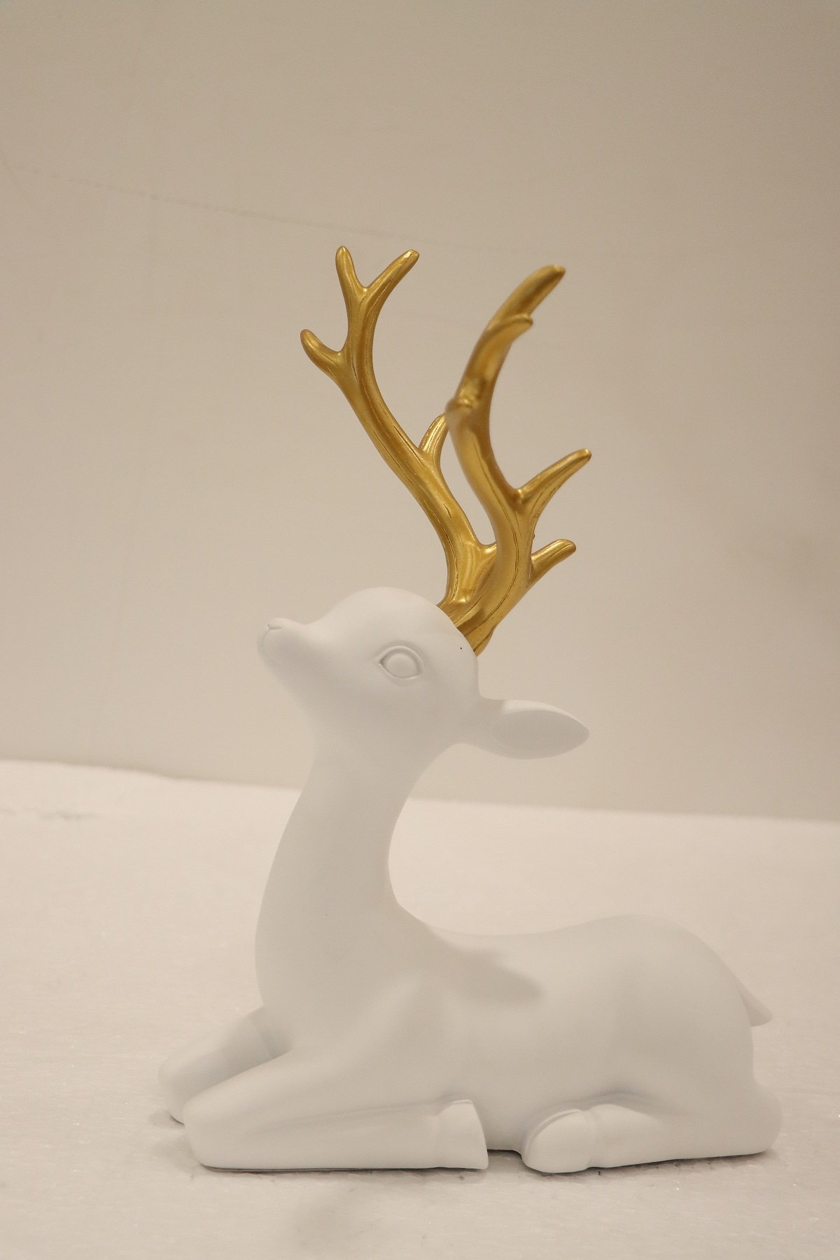 Elegant Gold & White/Black Reindeer Figurines - Image 6
